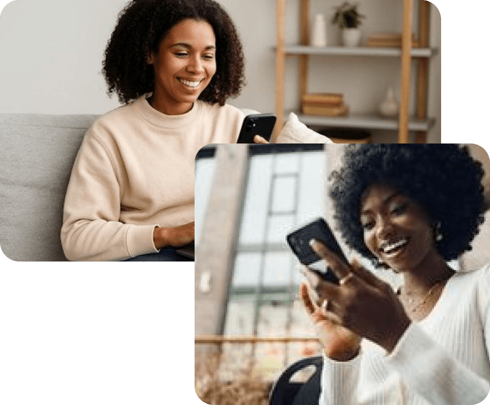 Woman smiling on couch using phone
